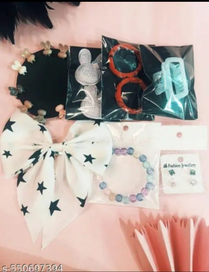 2 hair bands , 1 clutcher, 8 mini hair clips , 1 hair bow, 1 earings